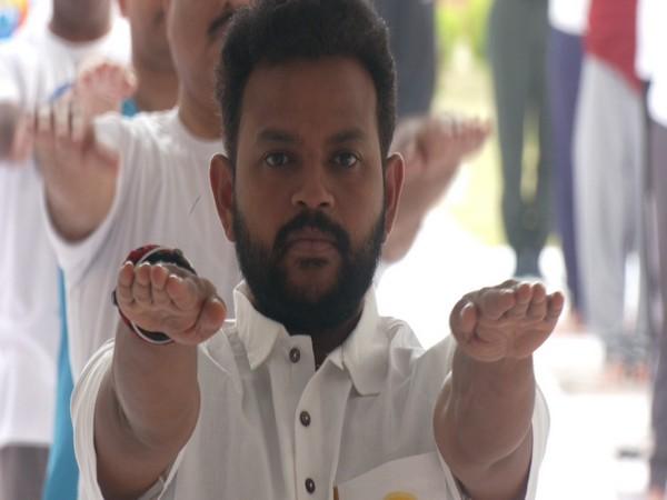 Union Civil Aviation Minister Ram Mohan Naidu Leads Yoga Event on International Yoga Day