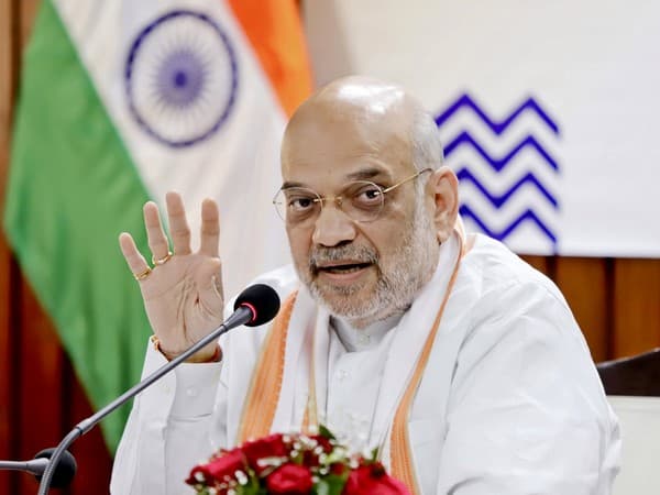 Amit Shah's Gujarat Visit: Stamps, Police Conference, Dairy Plant, and Lake Inauguration