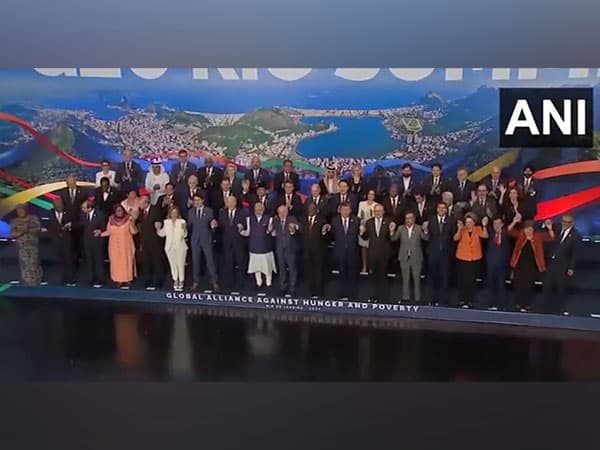 PM Modi and other G20 leaders pose for a family photo at Summit