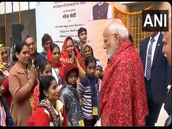 PM Modi inaugurates Swabhiman flats for dwellers of JJ clusters in Ashok Vihar, Delhi