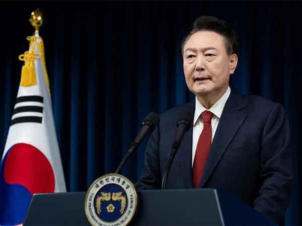 South Korean President held post weeks of evasion